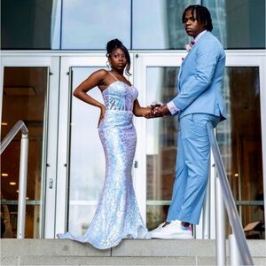 Prom dress size small .Colors purple blue white with sequin and a nice gown look